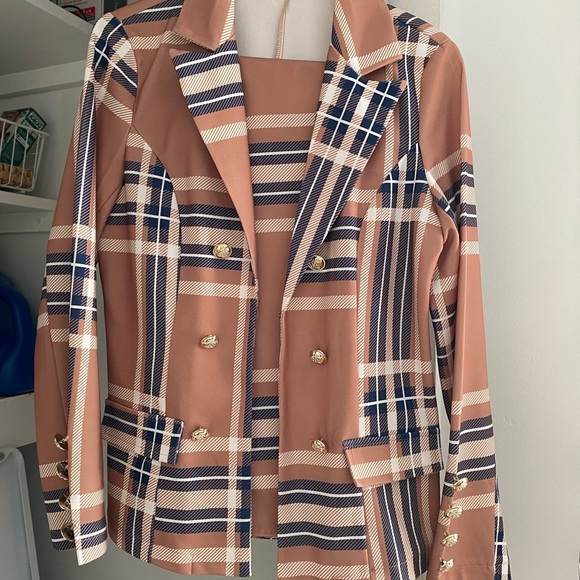 2 women’s size M business suits. Worn once each. Definitely a head turner. - Picture 3 of 3